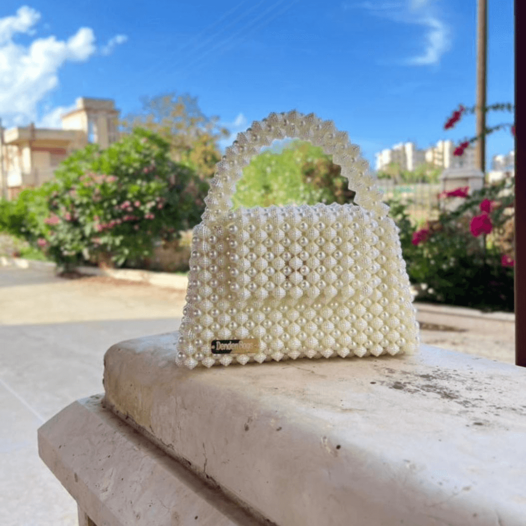 جزدان لولو و حبات التوت بيج تقيل