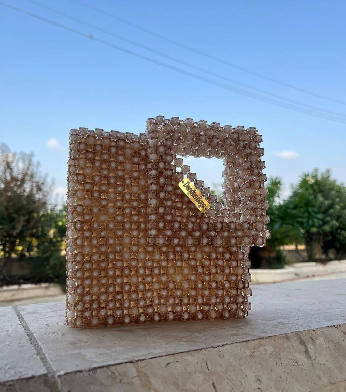 جزدان أكريليك بتصميم هندسي مثلث